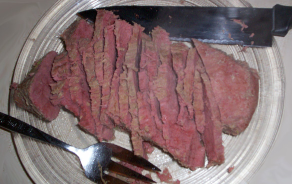 Corned Beef and Cabbage - Slicing the meat