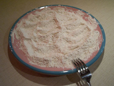 Dip talapia in seasoned flour